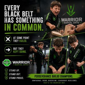 child in black martial arts uniform breaking a board
