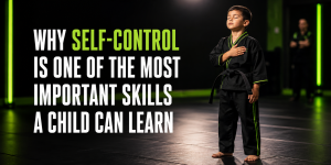 self control, child calm in a black martial arts uniform